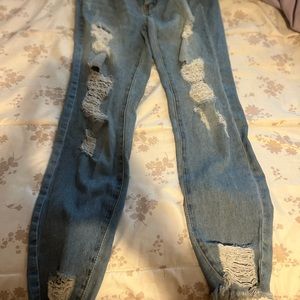 Distressed Jeans from fashion nova ! Only two wears out of them.